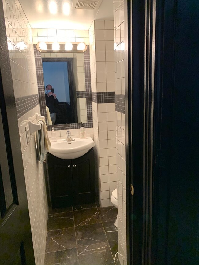 1st Floor Half Bath - 2429 W Clifton Ave