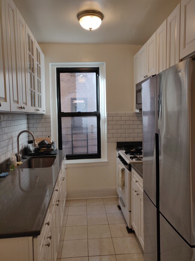 Building Photo - 3716 83rd St Apt 2G