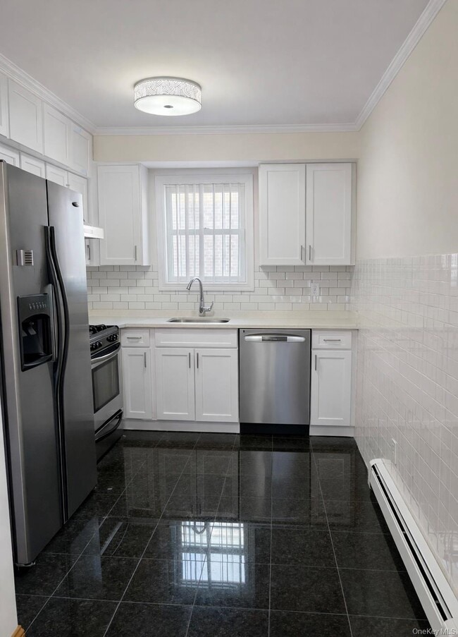 Foto del edificio - 214-27-214-38 38th Ave