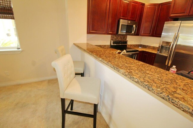 Building Photo - Kai Ani Villages Nicely Furnished Second F...