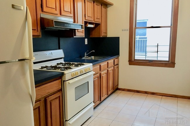 Building Photo - 6911 7th Ave