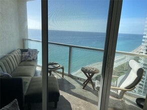 Building Photo - 16699 Collins Ave