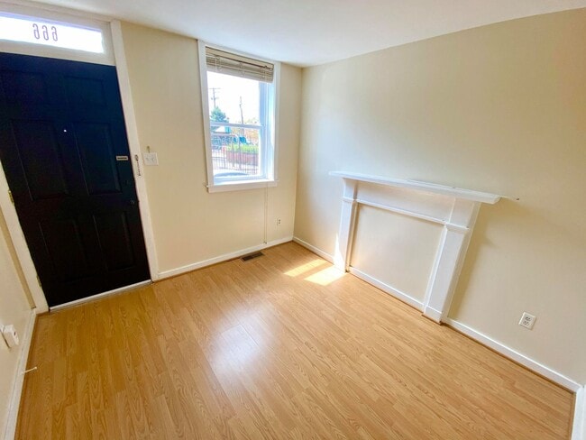 Building Photo - Charming 1BR with 1.5 Baths and Bonus Basement Room in the Heart of Ridgley’s Delight