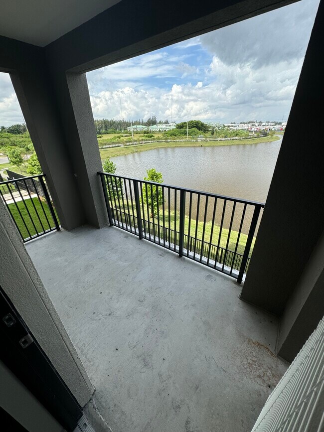 Building Photo - 8769 W 35th Ln