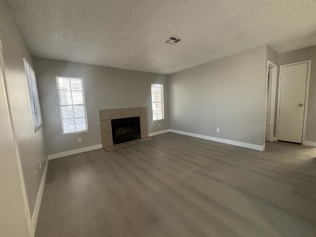 Building Photo - First month's rent 1/2 off!  2 Bed / 1 Bath open floor plan with new LVP and private washer/dryer!