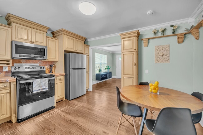 Updated full kitchen with cookware, dishes, and appliances. - 2301 North Dr