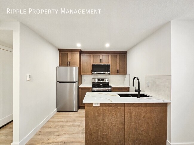 Photo du bâtiment - BRAND NEW 1 BED 1 BATH LOWER UNIT