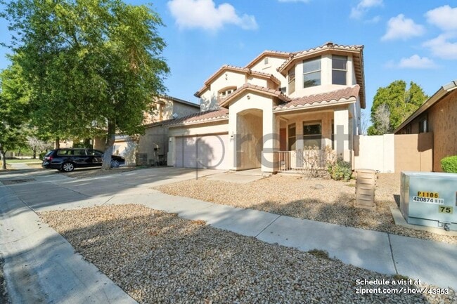 Building Photo - 6841 S 26th Pl