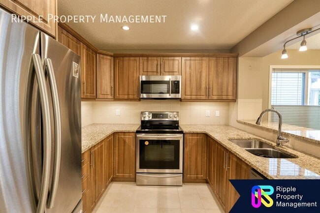 Photo du bâtiment - Modern 2 Beds+ Loft, 2.5 Baths TownHouse |...