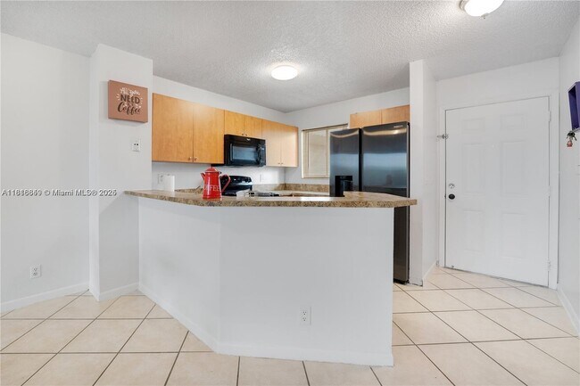 Building Photo - 8730 N Sherman Cir