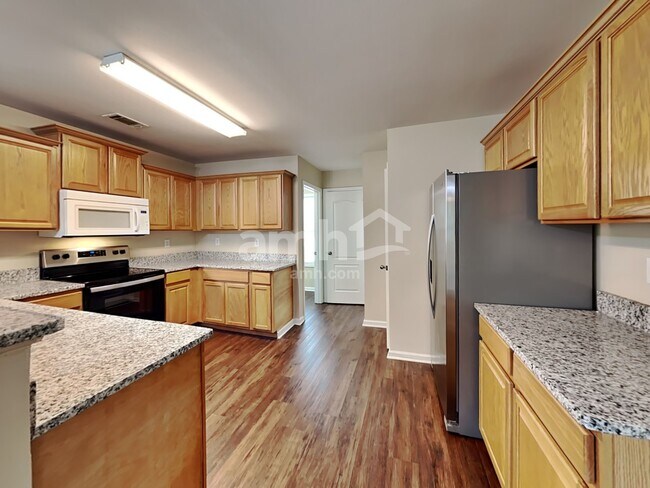 Foto del edificio - 6433 Grand Hickory Dr
