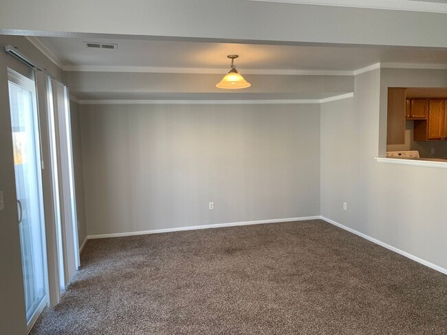 Building Photo - 3 BEDROOM,  2.5 BATHROOM TOWNHOUSE WITH 2 ...