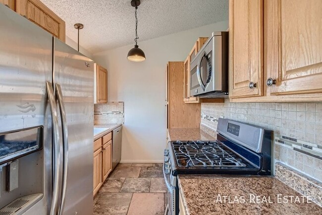 Building Photo - 7790 Belford Dr