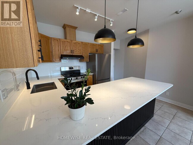 Photo du bâtiment - 3635-3635 Dundas St W