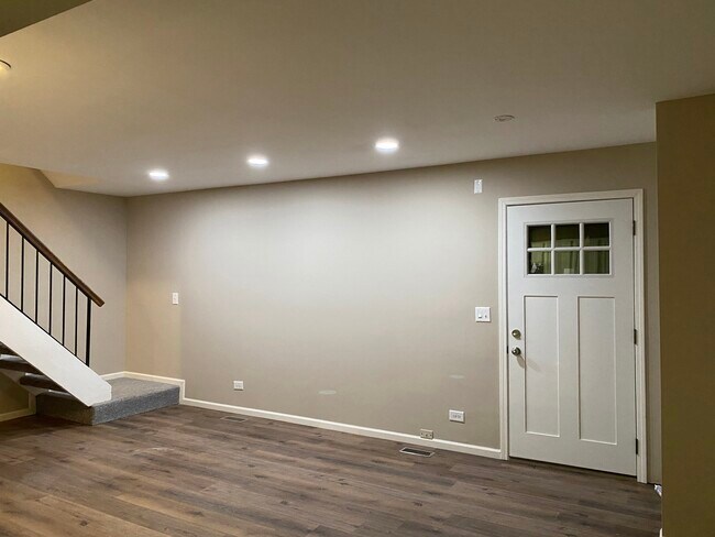 Living Room with Stairs - 325 Meadow Ct