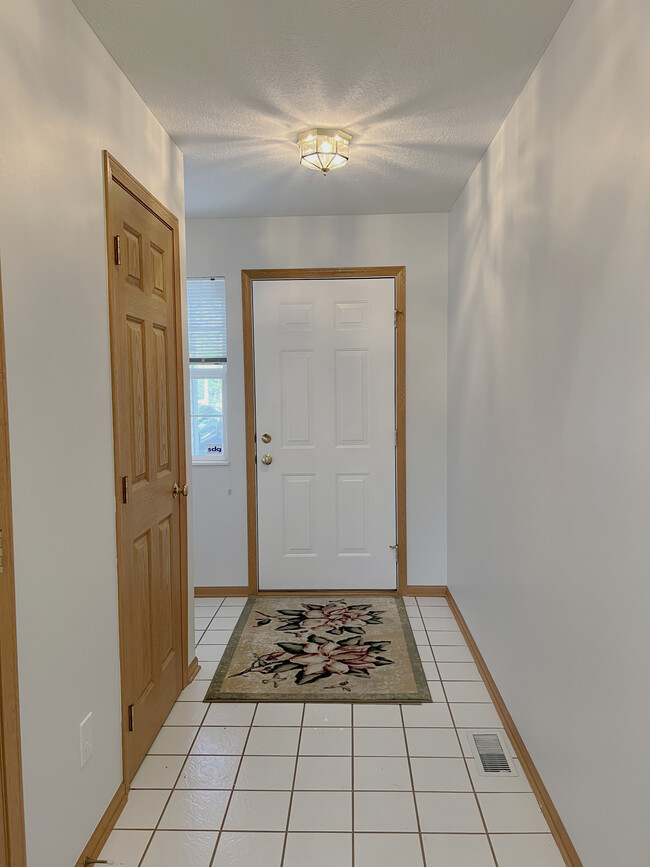 Front Hallway & Coat Closet - 319 Sycamore Ridge Way