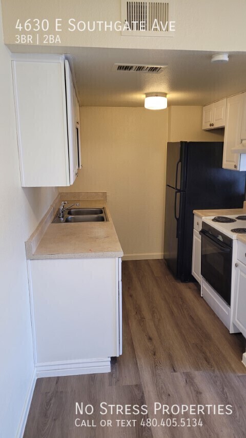 Building Photo - Remodeled 3 Bed Town Home of 40th St & Bro...