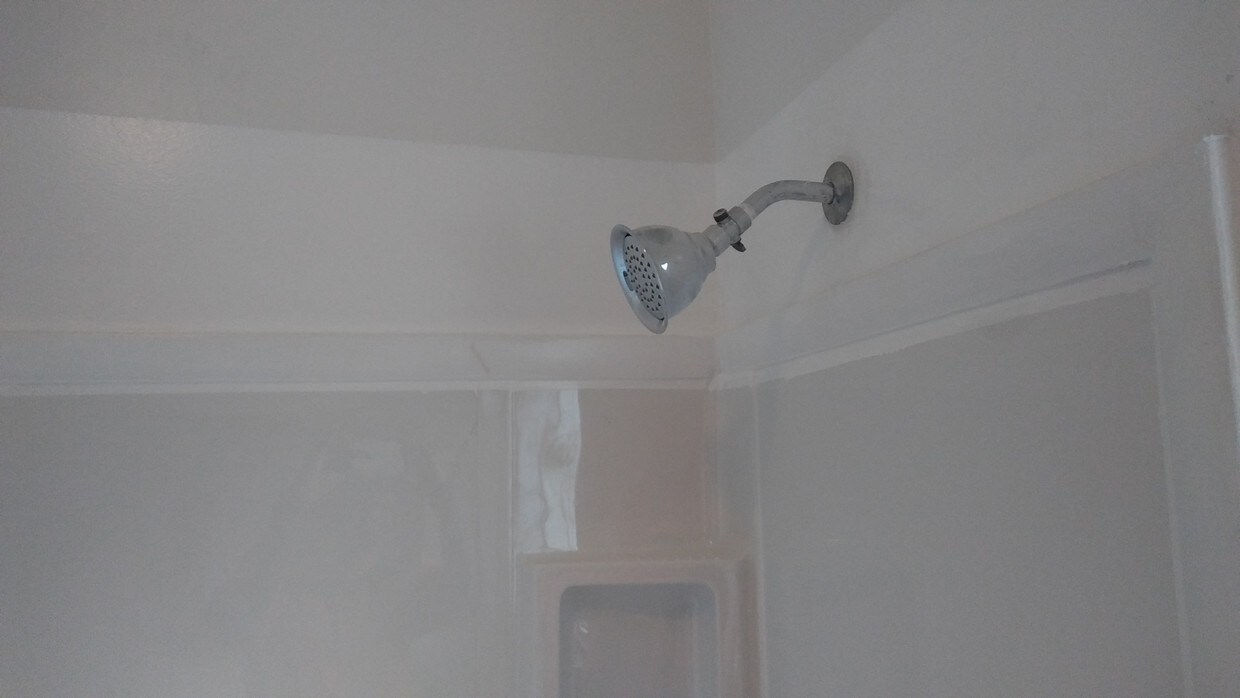 New shower, wrap around , tub and toilet - 609 Catherine St