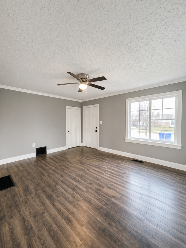 Building Photo - Updated 2BR Home with Finished Basement and 2-Car Garage