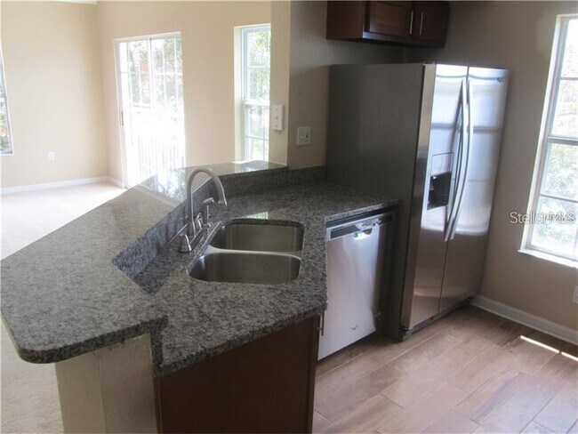 Building Photo - 9020 Lake Chase Island Way