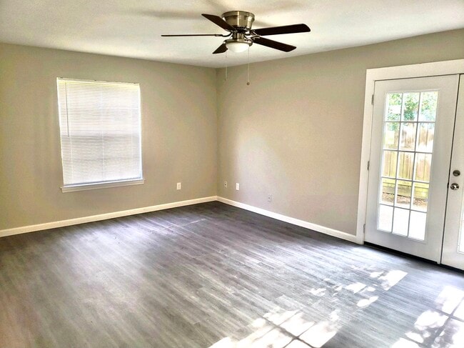 Living Room with new floors throughout entire house - 10015 Valley Lake Dr