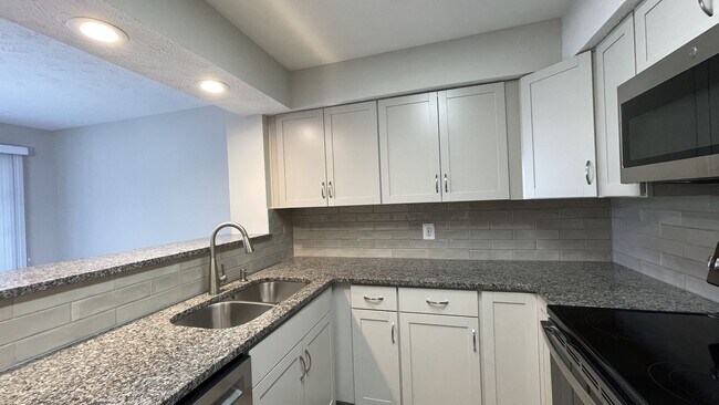 Building Photo - One Bedroom Condo in 55+ Community