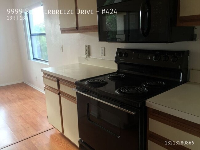 Building Photo - 9999 Summerbreeze Dr