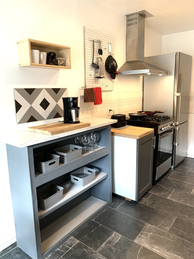 newly renovated kitchen with touch of boho chic - 1317 Franklin St