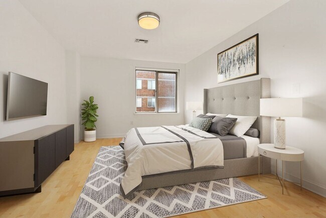 Foto del edificio - Luxury 2-bed + 2-bath Upper Floor Condo Ne...