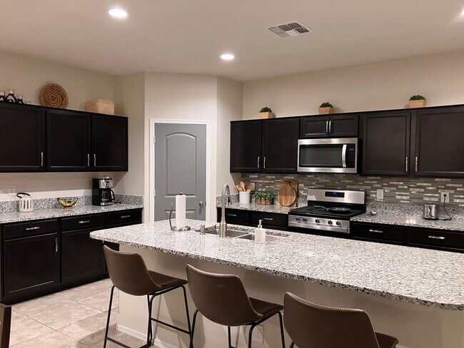 Building Photo - Available as fully furnished or unfurnished! Great Price!!