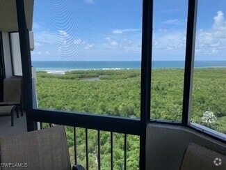 Building Photo - 6001 Pelican Bay Blvd