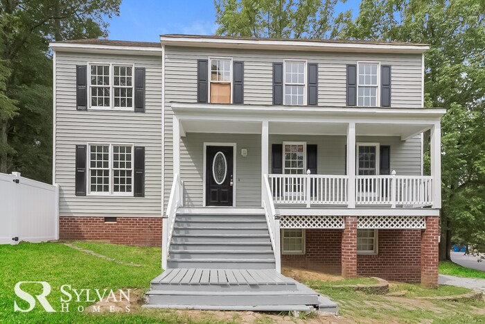 Primary Photo - This spacious 4BR 2.5BA home features an o...