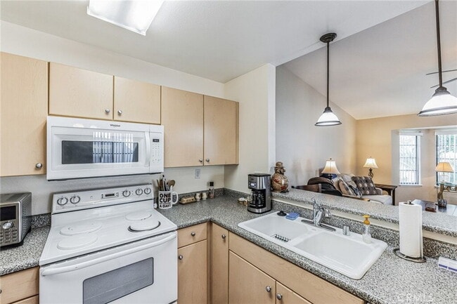 Building Photo - 55+ Age restricted community - This spacious 2-bedroom, 2-bathroom Home is located in the desirab...