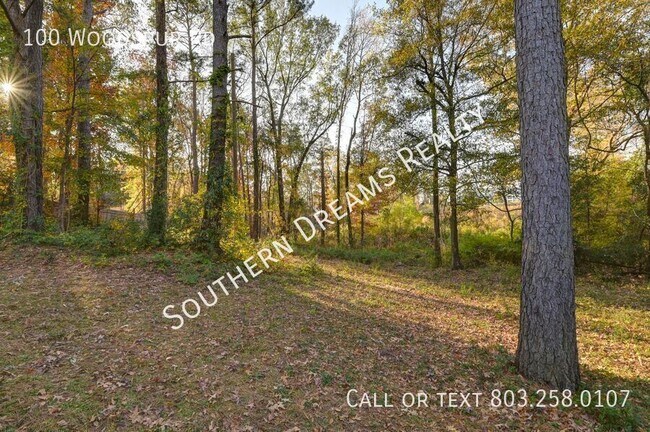 Foto del edificio - 100 Woodspur Rd