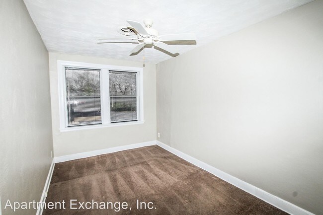Building Photo - 305-311 S Florissant Rd