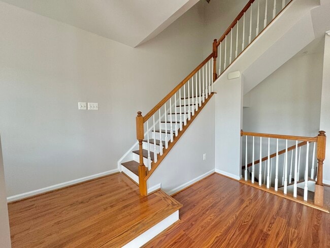 Main level stairs going up to bedrooms on 3 level - 25530 Joy Ln