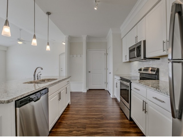 Grady 2 Kitchen with Wood Style Flooring - Kelly Reserve Apartments