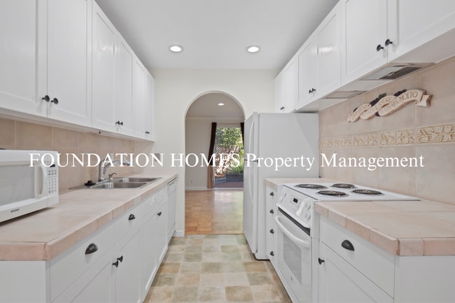 Photo - Bright & Tranquil End Unit!  A/C! Parking! Community Pool! FOUNDATION Apartment