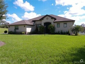 Building Photo - 1381 N Spend a Buck Dr