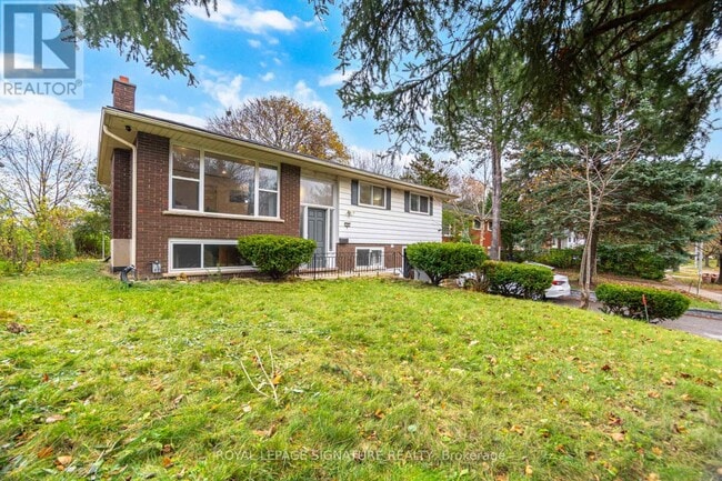 Building Photo - 406 Tamarack Dr