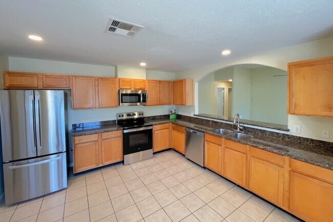 Foto del edificio - 6503 Wellington Meadows Dr