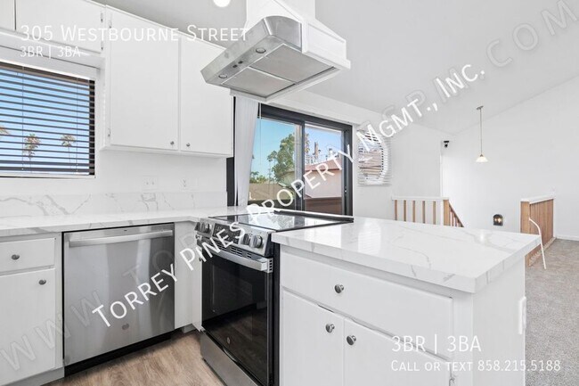 Foto del edificio - STUNNING 3BR Townhome with Garage, 1 BLOCK...