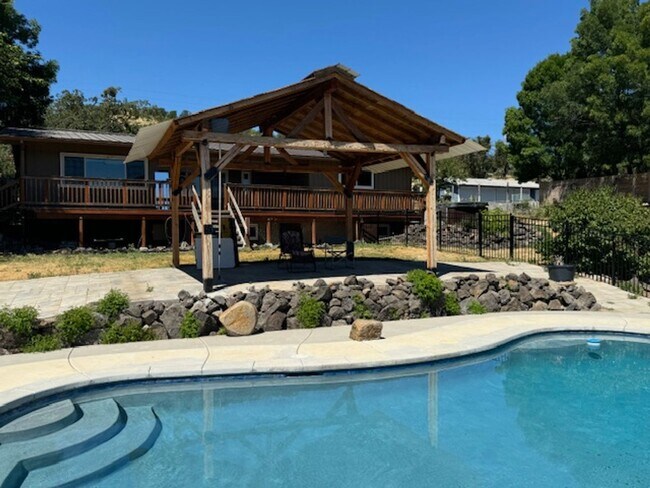 Building Photo - SPACIOUS AND PRIVATE LARGE HOME WITH SWIMM...