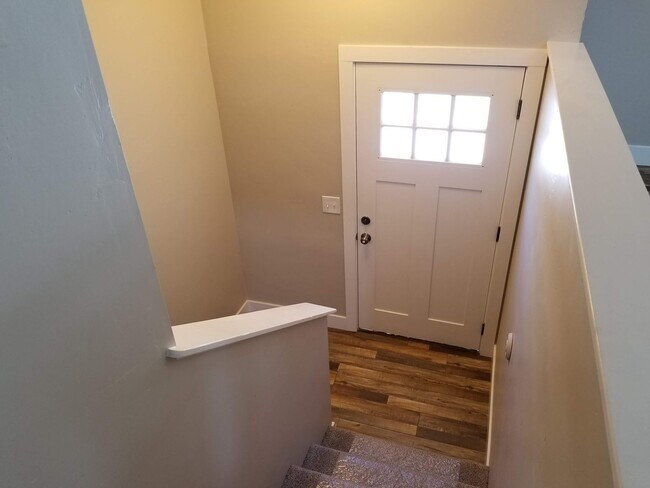 Photo - Spacious 5-Bedroom Magna Home with Deck and Ample Parking