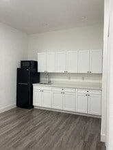 Kitchen with fridge, micro and storage space - 22916 SW 115th Ave