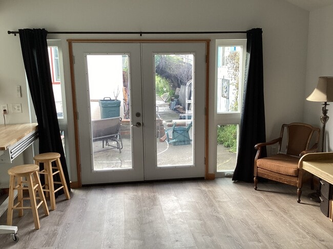 Main room/ barrier walls added and patio area clear. - 2519 Rheem Ave