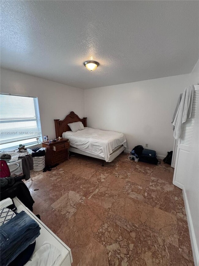 Building Photo - 9008 Collins Ave