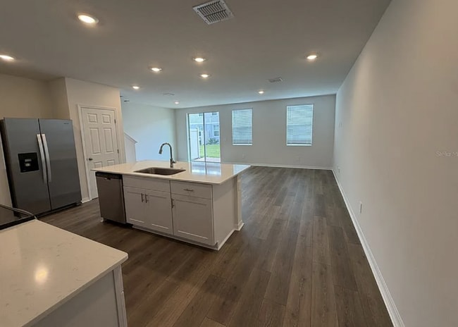 Photo - "Spacious 3-Bedroom Townhouse with Granite Elegance in St. Cloud – 4543 Rangeland Way"