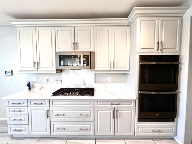 Building Photo - Recently reduced Four Bedroom 3 Full Bathr...