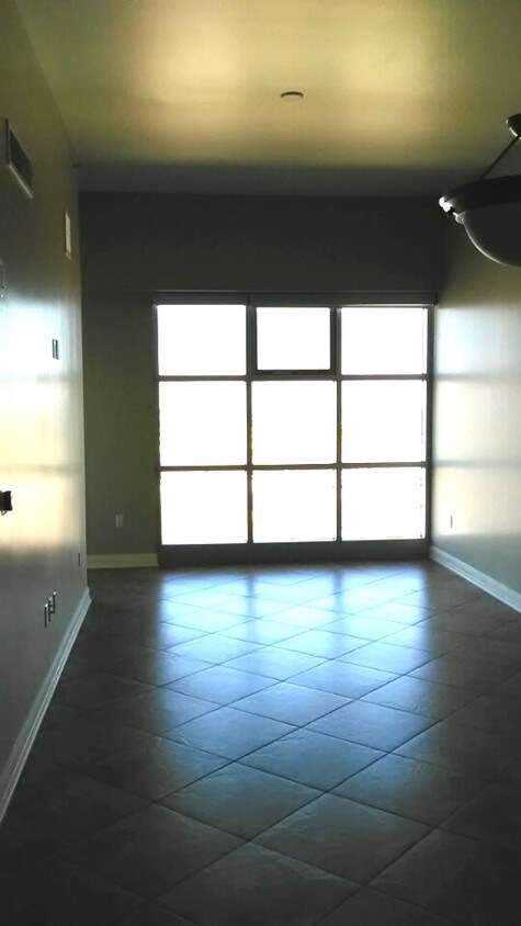 Main Living Area with balcony on left - 150 S Las Vegas Blvd